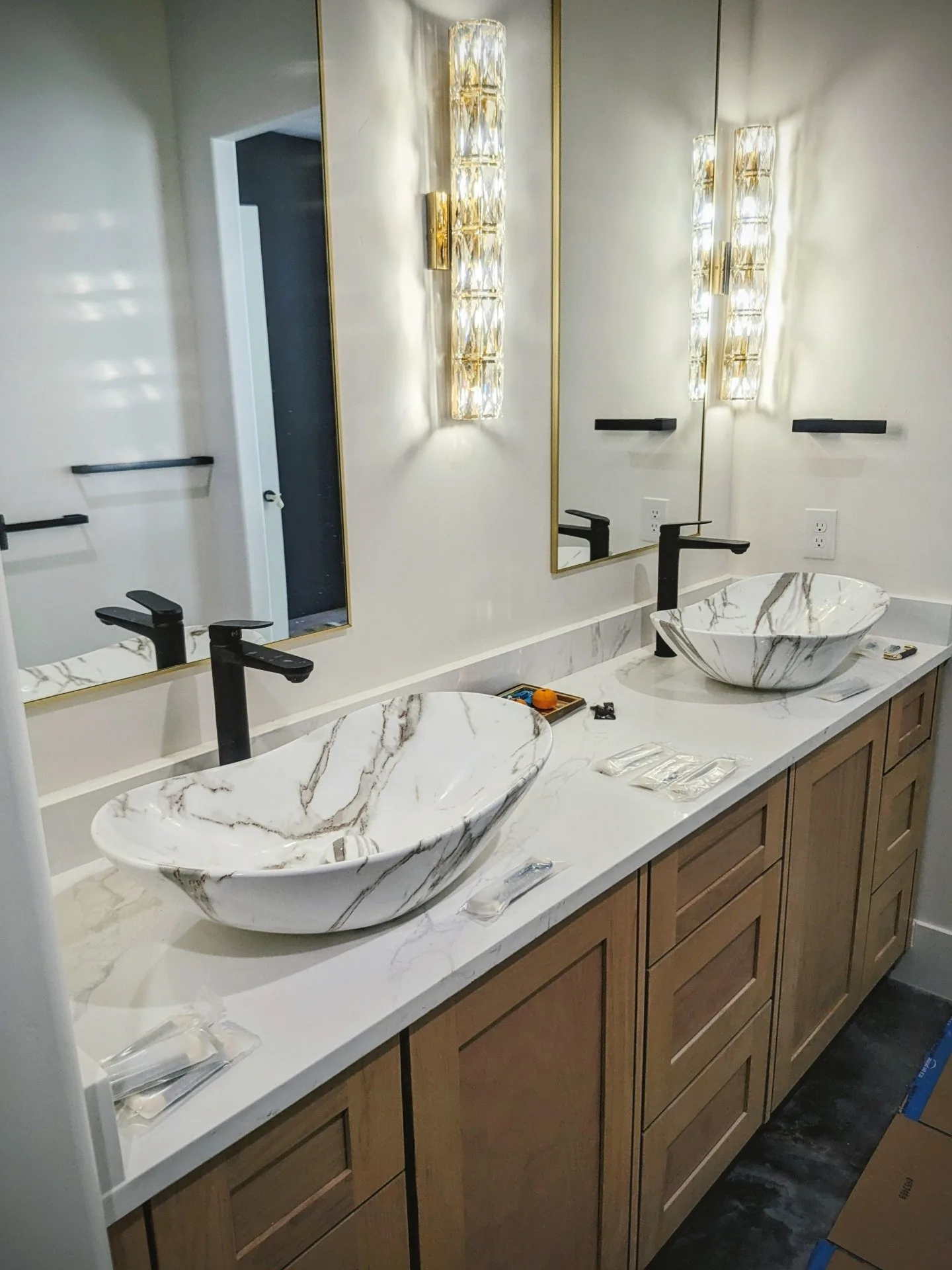 Finished bathroom vanity and plumbing fixtures
