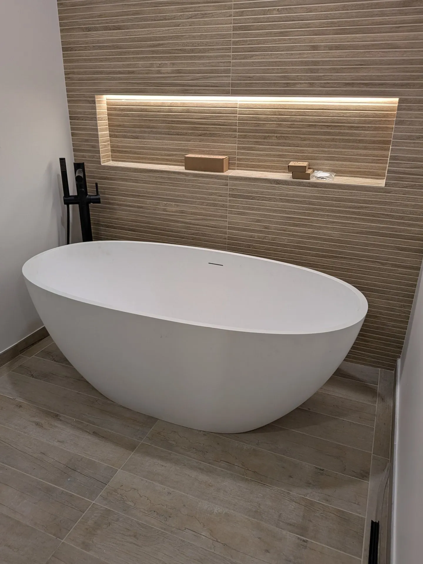 Finished freestanding tub installation by Quick Quality Plumbing
