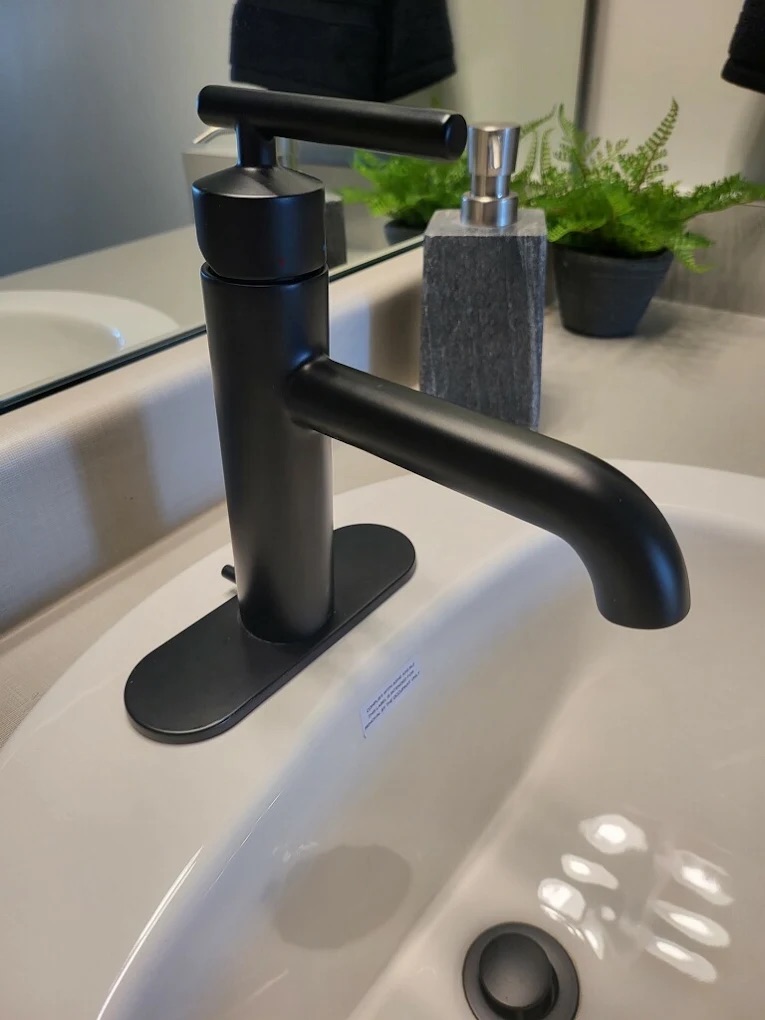 Modern matte black bathroom faucet and sink